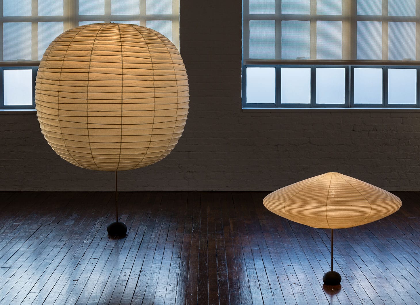 Installation view, Akari: Sculpture by Other Means, from left: Isamu Noguchi, Akari 125F (1971), and 15A (1953), on BB2 and BB3 bases (1954) (image courtesy Noguchi Museum)