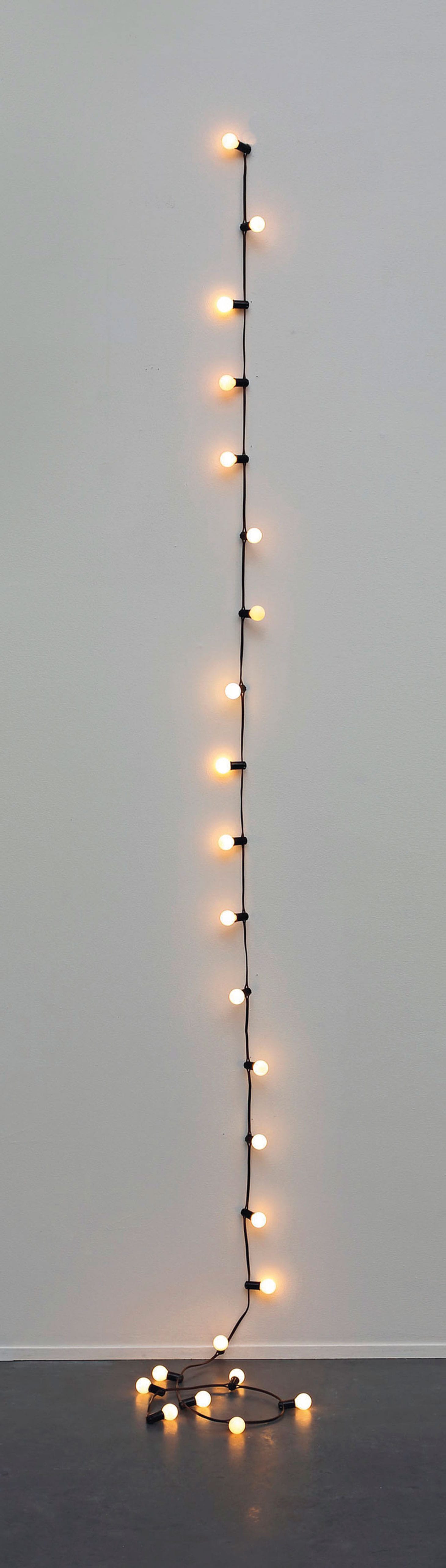 Felix Gonzalez-Torres, “'Untitled' (Last Light)" (1993), light bulbs, plastic light sockets, extension cord, and dimmer switch, overall dimensions vary with installation (image courtesy Christie's)