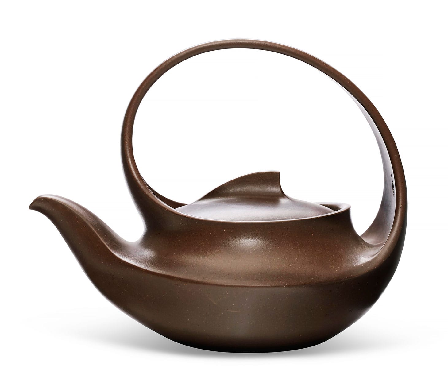 A compressed Yixing teapot and cover, "Flowing" by Wang Yinxian and Zhang Shouzhi, 8 1/4 inches across (image courtesy Christie's)