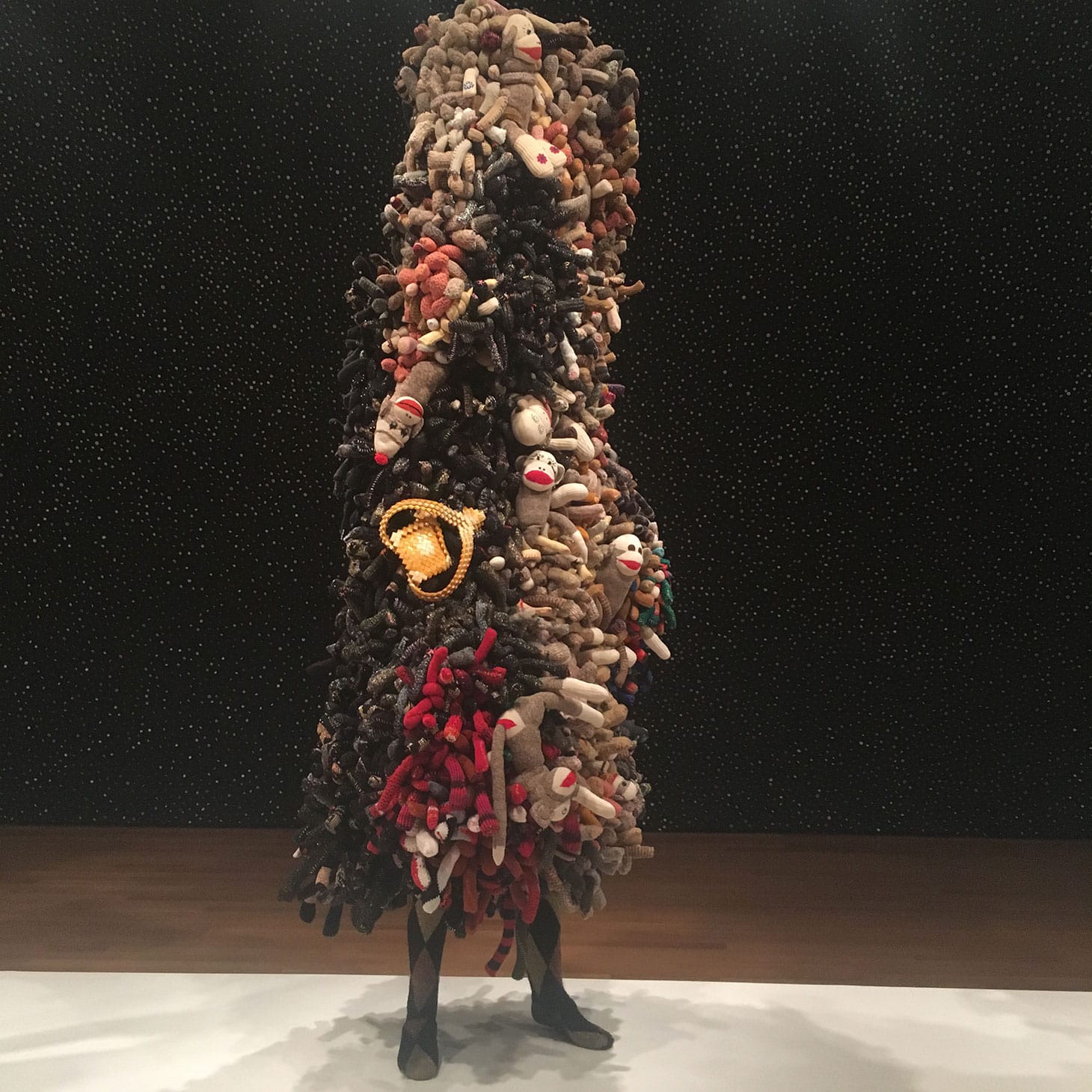 Nick Cave, “Soundsuit” (2013), mixed media, including sock monkeys, sweaters, and mannequin, 105 x 48 x 36 inches