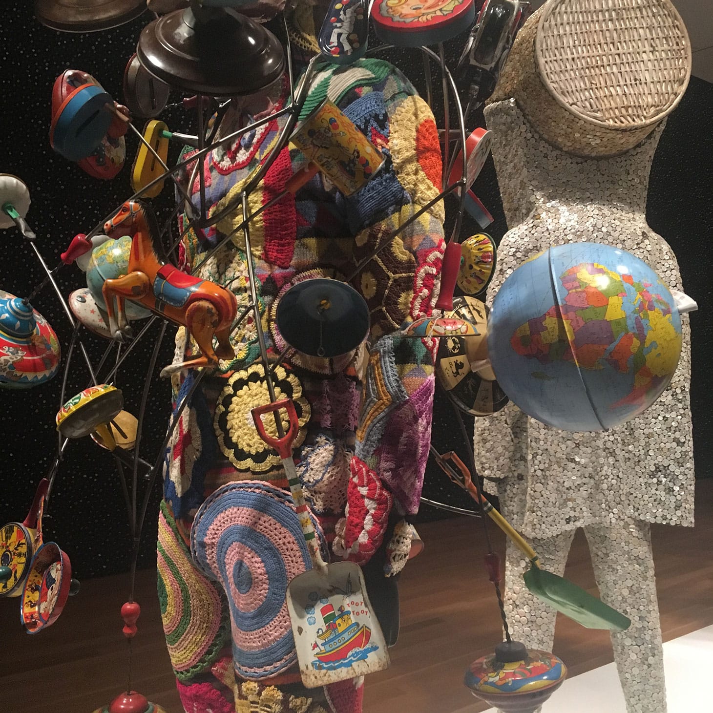 Nick Cave, detail of “Soundsuit” (2016), mixed media, including a mask with horns, various toys, globes, wire, metal, and mannequin
