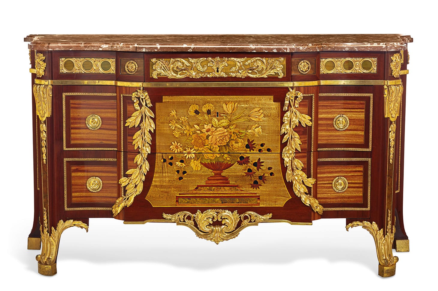 Jean-Henri Riesener, a Louis XVI ormulu-mounted bois satine, amaranth, sycamore, and marquetry commode (1774), 37 1/2 inches high, 65 3/4 inches wide, 25 1/2 inches deep (image courtesy Christie's)