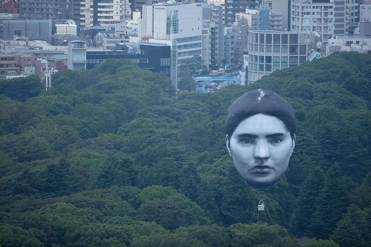Giant Balloon Face Floats Over Tokyo