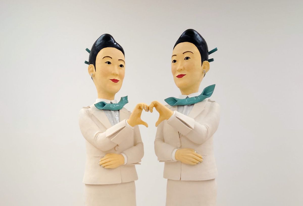 Behind a Flight Attendant’s Painted-On Smile