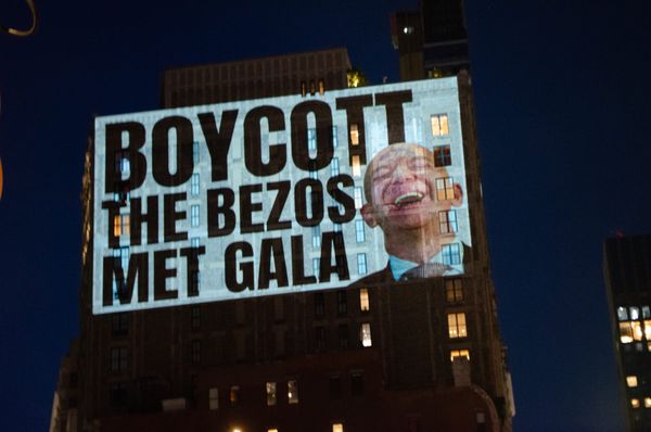 Met Gala Boycott Message Projected on Bezos’s Manhattan Penthouse