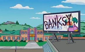 Banksy Spray Paints on Cartoon Walls