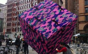 Astor Place Cube Latest to Get a Crocheted Cozy [UPDATED]