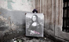 The Masked Man of Honduras Brings Street Art to Its Knees