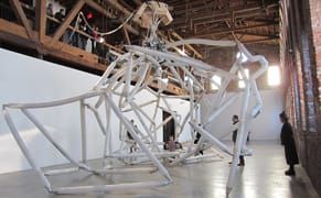 A Colossal Inflatable Robot Opens Its Arms Into a Portal