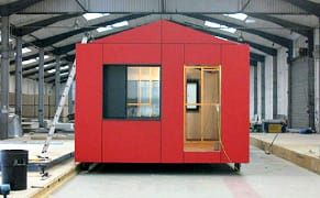 A Tiny Red House for the Homeless