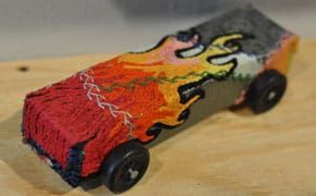 Gallery Hosts Miniature Gravity Car Race Featuring 100s of Artist-Designed Chariots