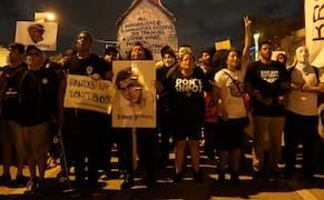 Hundreds Take to the Streets to Seek Justice for Artist Killed by Miami Police