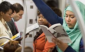 Catching Subway Riders in the Act of Reading
