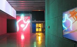 The Seduction of Screens and Neon at Night