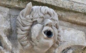 Gargoyles of Charlie Hebdo Cartoonists Appear on 12th-Century French Tower