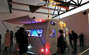 Peering into a Caravan Haunted by Marionettes