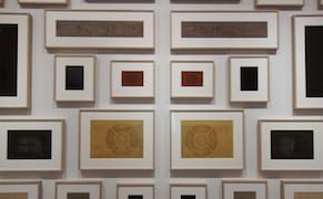 The Abstract Patterns of Sound on Dusty Speaker Covers