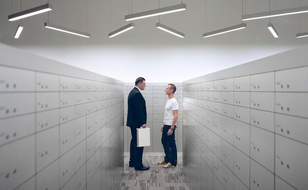 Paolo Woods and Gabriele Galimberti, “Tony Reynard and Christian Pauli, in Singapore Freeport” (2015), photograph (courtesy t