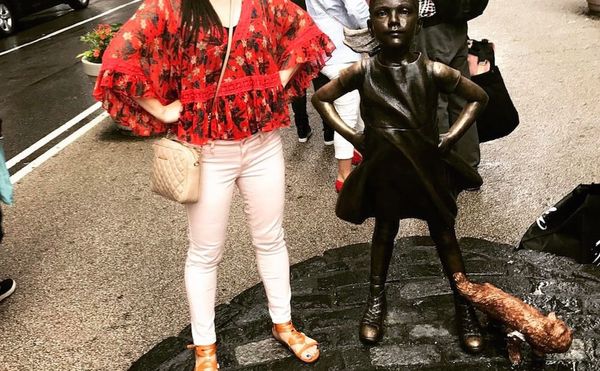 Artist Places “Pissing Pug” Sculpture at the Feet of “Fearless Girl”