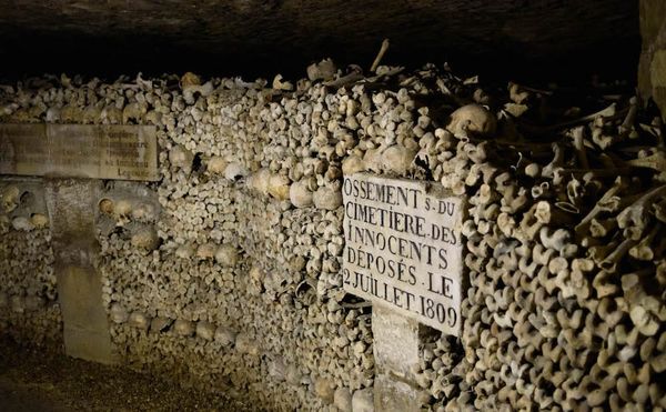 The Paris catacombs (photo by Joe deSousa, via Wikimedia Commons)