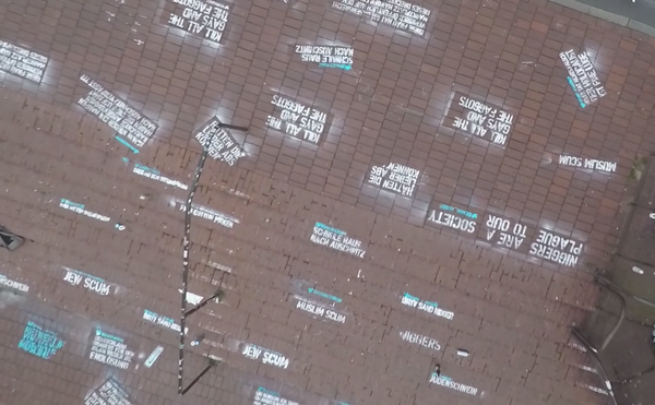 Comedian Spray Paints Hate Tweets Outside Twitter Headquarters