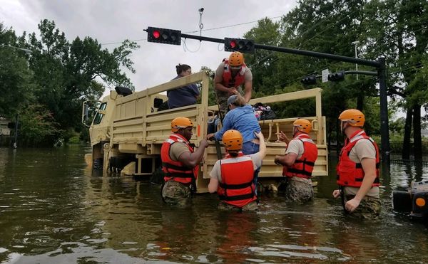 Texas National Guard soldiers conduct rescue operations in flooded areas around Houston, Texas, on August 27, 2017. (photo by