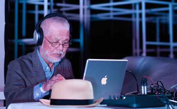 Yasunao Tone performing (photo by Plastiques Photography, courtesy of Serpentine Galleries, London)