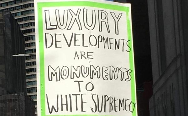 A People's Cultural Plan sign at a protest