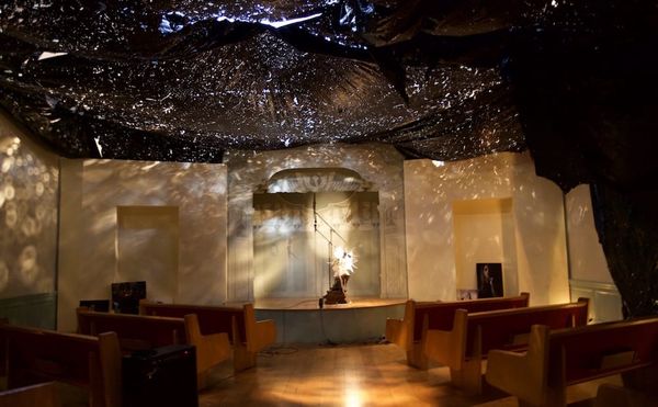 Installation view of Abigail DeVille’s Only When It’s Dark Enough Can You See The Stars at the former Peale Museum, organized