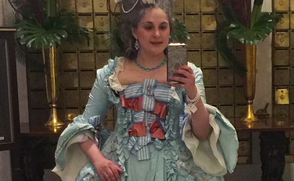 Eliza Vincz in the 18th-century style robe à la française that got her denied entry to the Metropolitan Museum. (photo courte