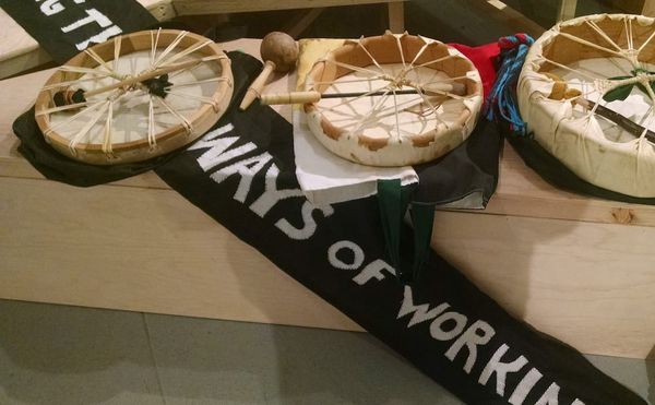 Drums on a triangular bench built by IV Castellanos for "Feet On The Ground," a participatory group performance by Esther Nef