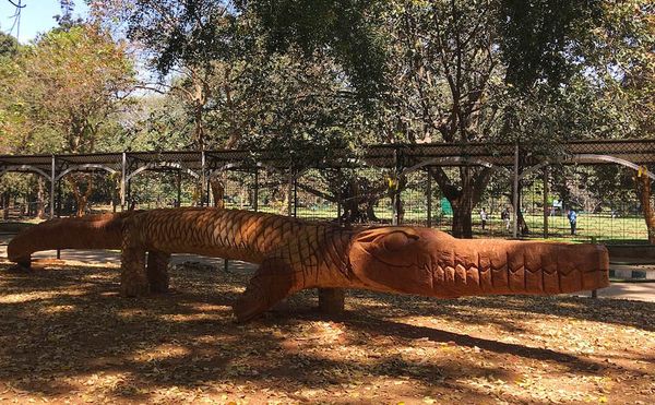 A sculpture carved from the trunk of a felled tree in Lalbagh Botanical Gardens
