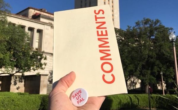 Studio Art and Art History undergraduate Logan Larsen drops off a self-designed zine and a button to the Provost and Dean Dem