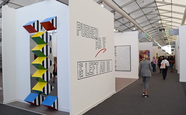 Works by Daniel Buren and Lawrence Weiner on the exterior of the Lisson Gallery booth at Frieze New York (all photos by the a