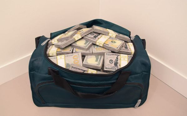 Matt Johnson, "Movie Money (1.75 Million Dollars in a Gym Bag)" (2018), carved wood with paint, 13 x 21 x 15 in, in 303 Galle
