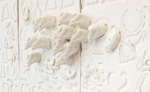 A Meditation on Identity through Chickenheads and Chains