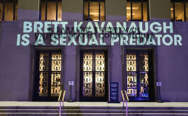 Artist Projects "Brett Kavanaugh Is a Sexual Predator" Onto DC Courthouse