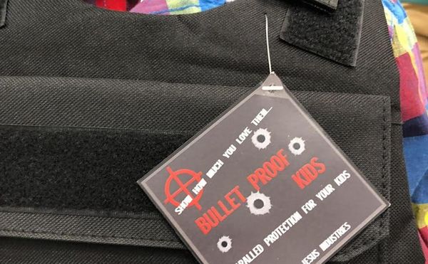 Artist Infiltrates Back-to-School Shopping Displays with Bulletproof Vests