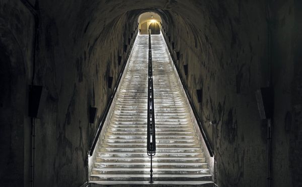 A Drunk, Dark, and Gritty Show in a French Wine Cellar