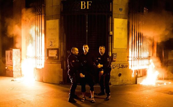 Russian Artists Convicted in French Court for Setting Fire to Bank of France in Performance