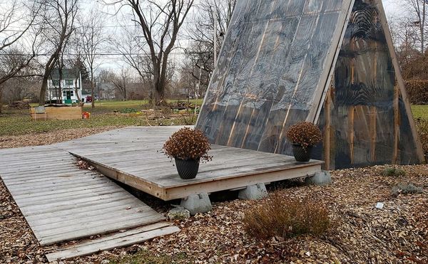 Detroit's New Mini Community Center Is a Greenhouse by Day, Movie Theater by Night
