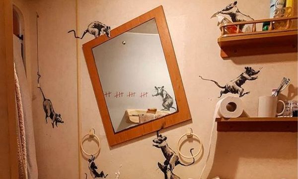 How Is Banksy Spending Quarantine? By Turning His Bathroom Into a Work of Art