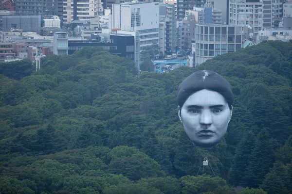 Giant Balloon Face Floats Over Tokyo