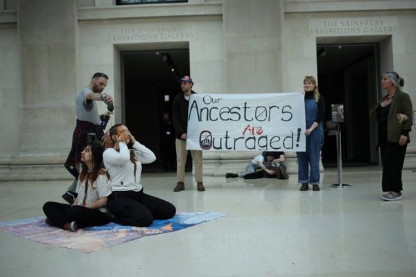 Dripping in "Oil," Activists Protest BP Sponsorship of Stonehenge Exhibition
