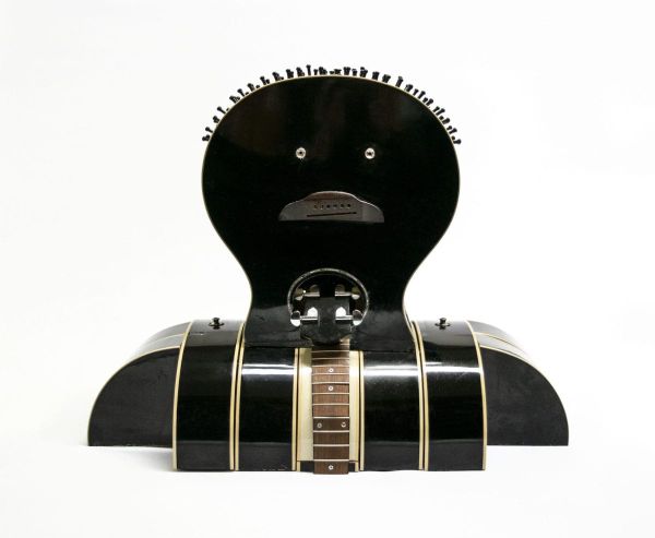 Willie Cole Recycles Musical Instruments Into Outstanding Sculptures