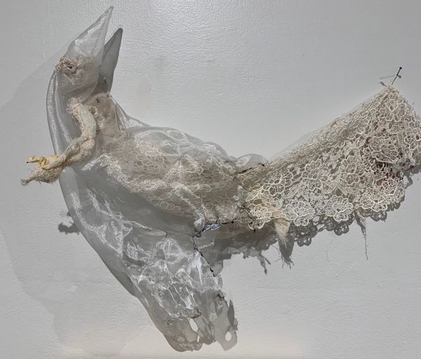 University Shutters Exhibition Featuring Klan Figures