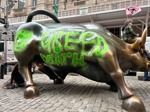 Climate Protesters Target NYC’s Iconic “Charging Bull” in Earth Day Protest