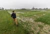 Deirdre Griffin LaHue, WSU assistant professor of soil quality and sustainable soil management, walks near the cover crop