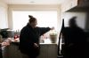 Heather Nguyen, who lives on Joint Base Lewis-McChord with her family, feeds her plant bottled water, which she says keeps