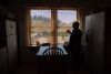 Mike Cross stands in the kitchen of an Oregon City group home for men convicted of sex offenses. In his 15 years serving